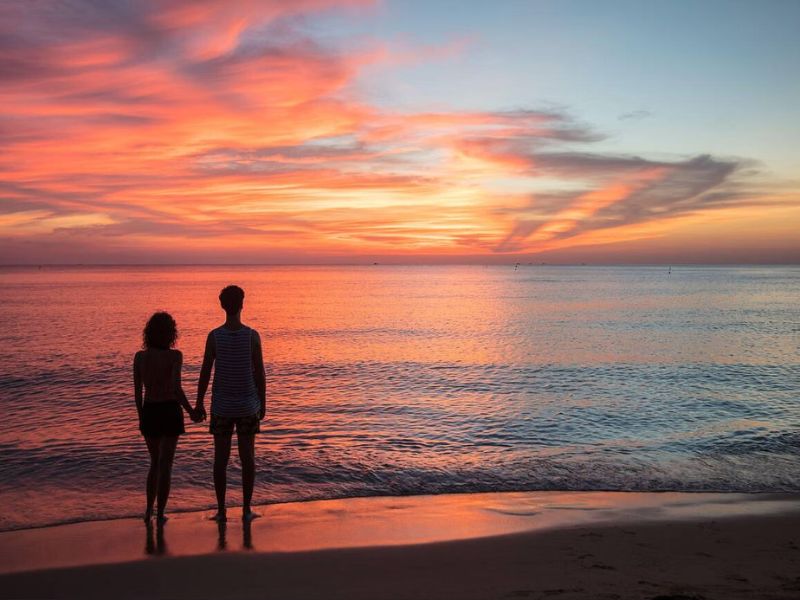 A romantic evening walk along Long Beach offers peaceful waves, soft sand, and moonlit serenity Corona Casino Phu Quoc