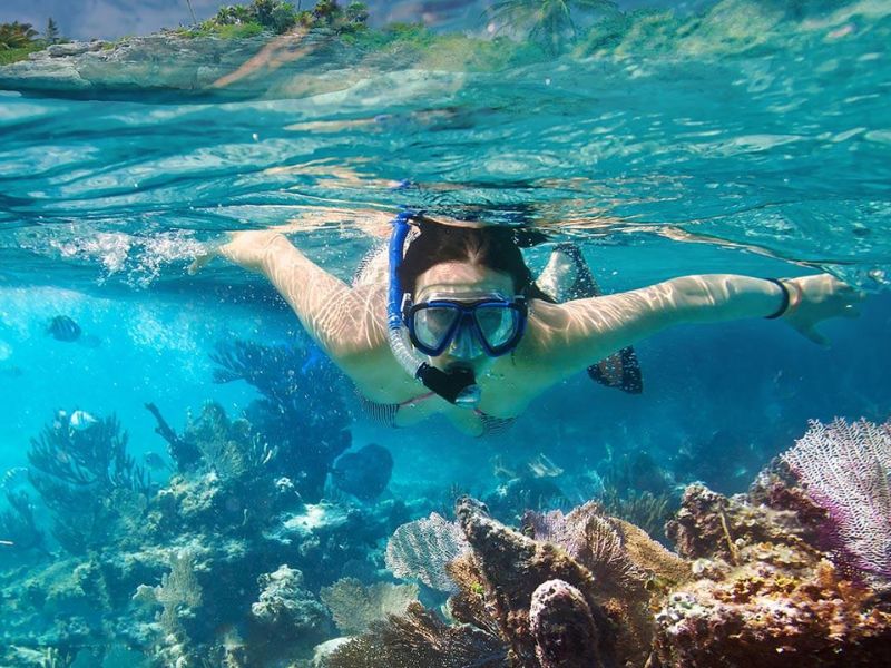 Clear waters for snorkeling at Sao Beach, featured by Corona Casino Phu Quoc