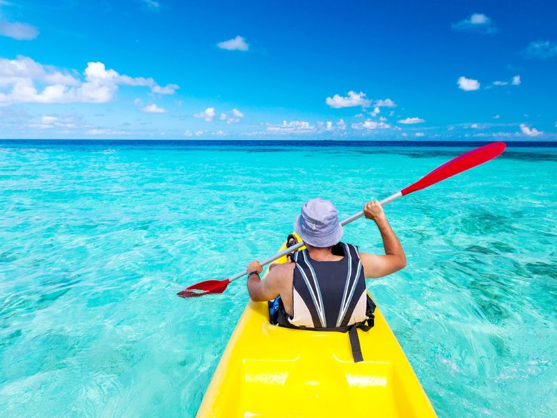 Tourists kayaking Ong Lang Beach close to Corona Casino Phu Quoc