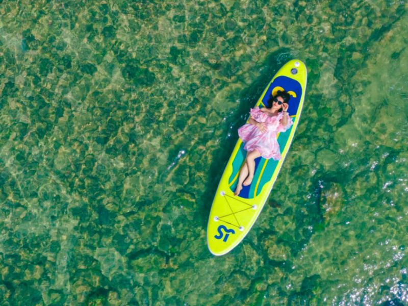 Swimming in clear waters of Rach Vem fishing village near Corona Casino Phu Quoc
