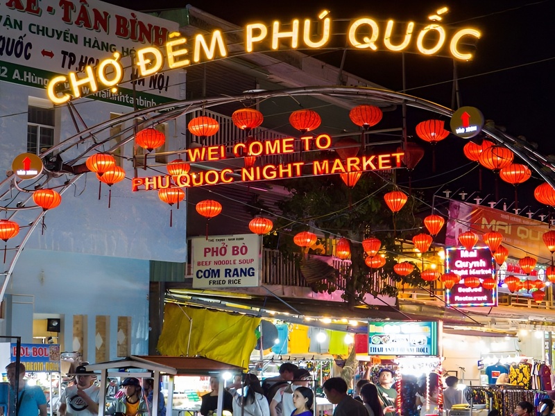 Travelers enjoying street food and shopping as they visit Phu Quoc Night Market and local markets while staying at the luxury Corona Casino Phu Quoc resort