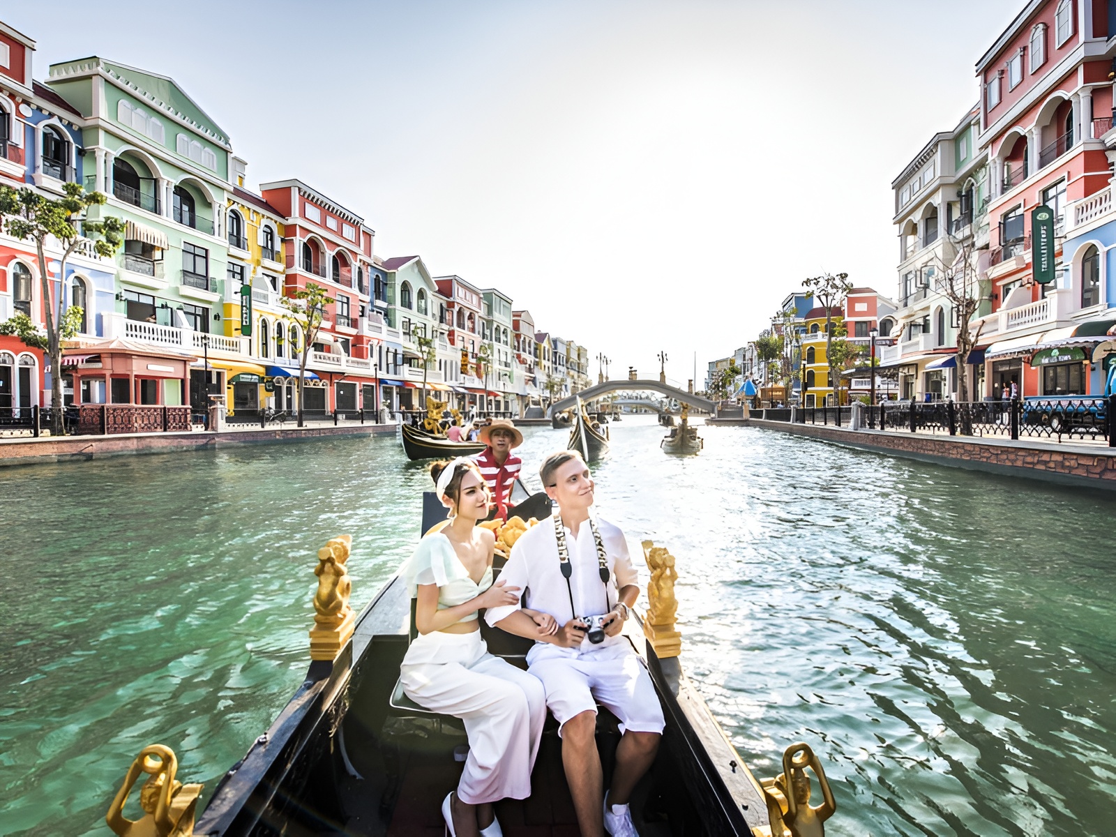 Couple enjoying a gondola ride along the Venice-inspired canal