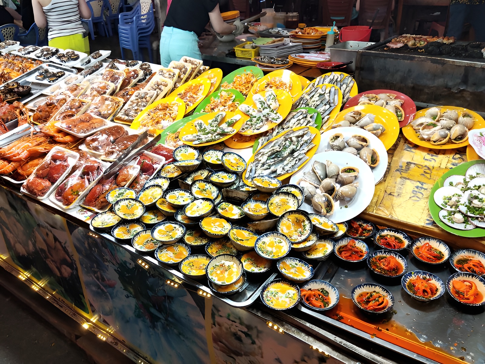 Vibrant nightlife and seafood dining at Dinh Cau Night Market close to Corona Casino Phu Quoc