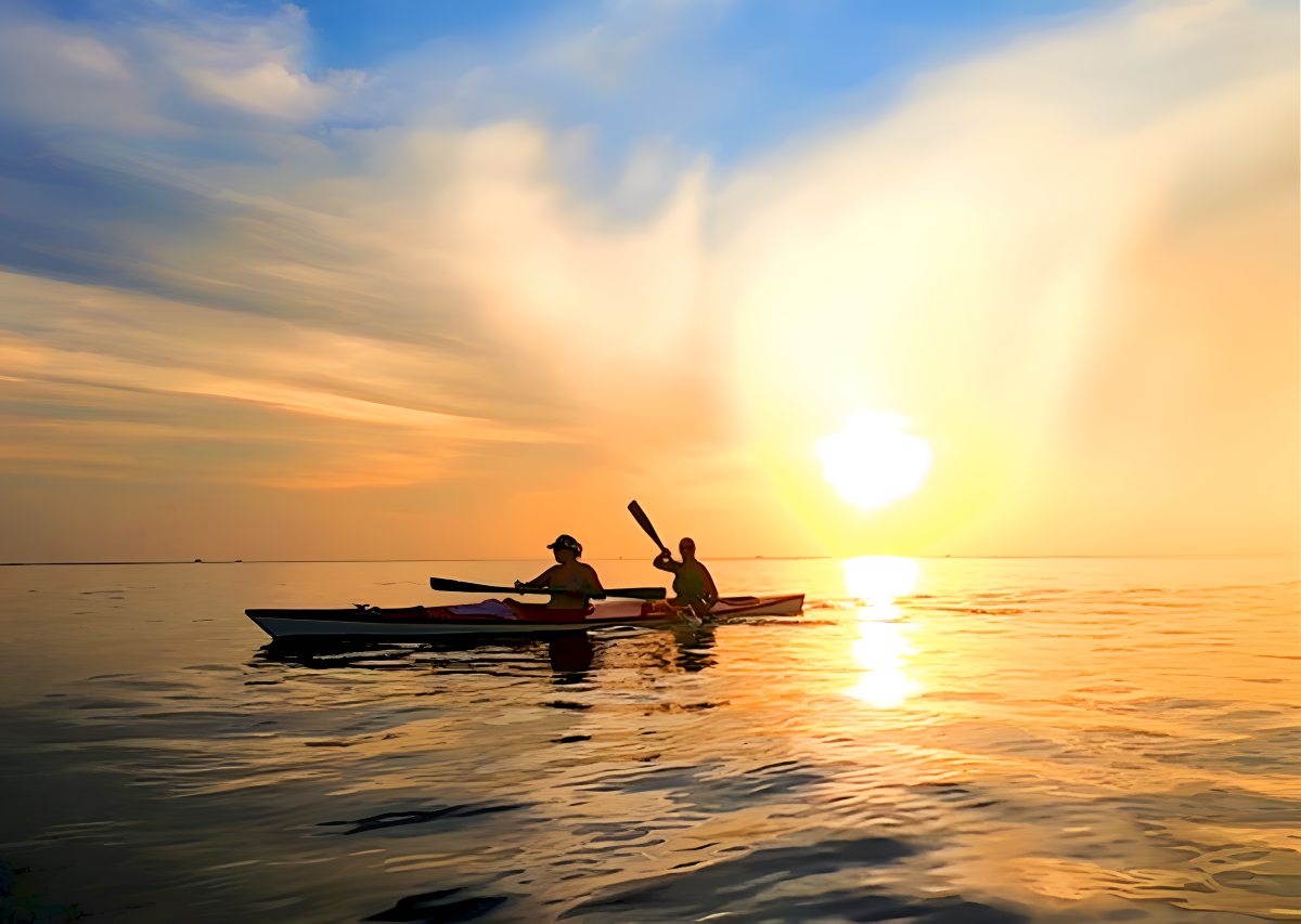 Families paddling in calm seas at Vung Bau Beach surrounded by nature near Corona Casino Phu Quoc