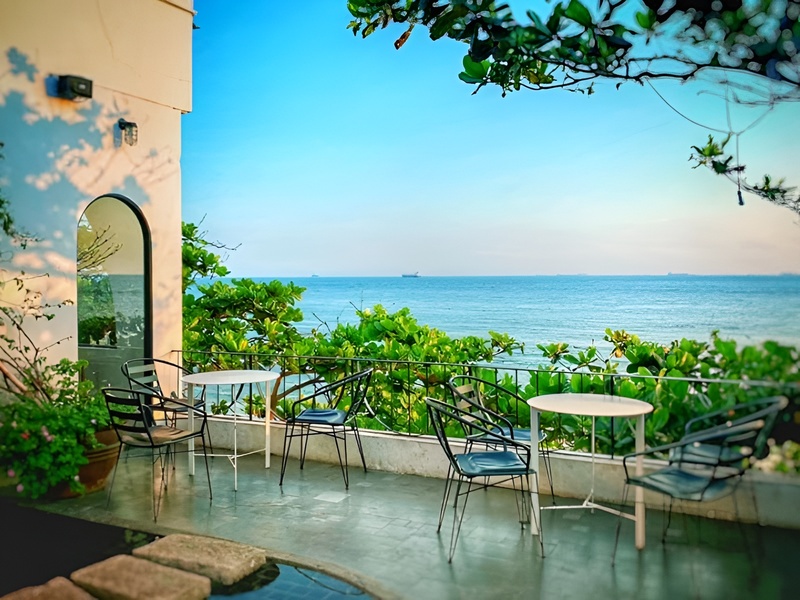 The clean lines and simple aesthetic of Tuc Cafe Phu Quoc's minimalist design a modern coffee spot near Corona Casino Phu Quoc