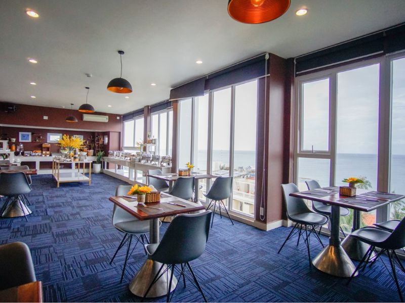 Guests enjoying the modern setting and menu at Brenta Sky Bar & Bistro a perfect evening spot close to Corona Casino Phu Quoc