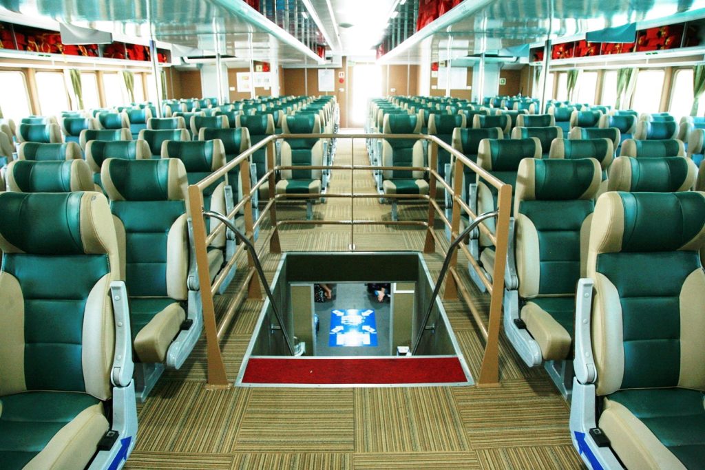 VIP cabin interior with leather reclining seats on a Phu Quoc Express catamaran serving guests of Corona Resort & Casino Phú Quốc