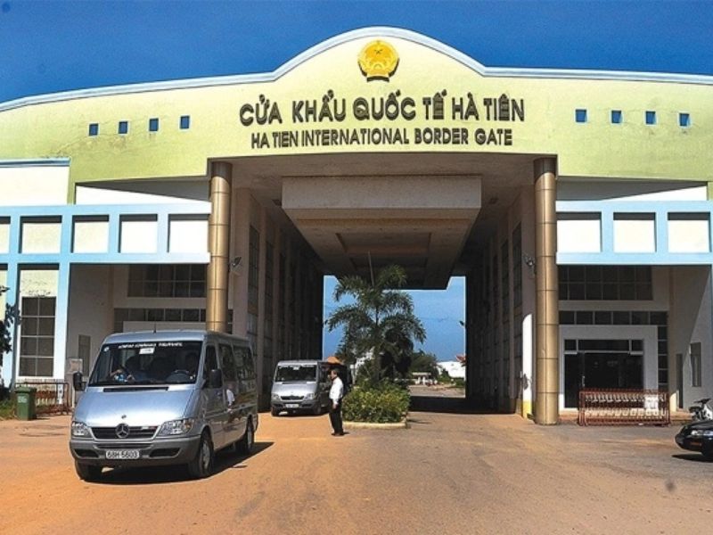 Travelers presenting their immigration stamps and documents at the land border gate before heading to the luxury Corona Casino Phu Quoc resort
