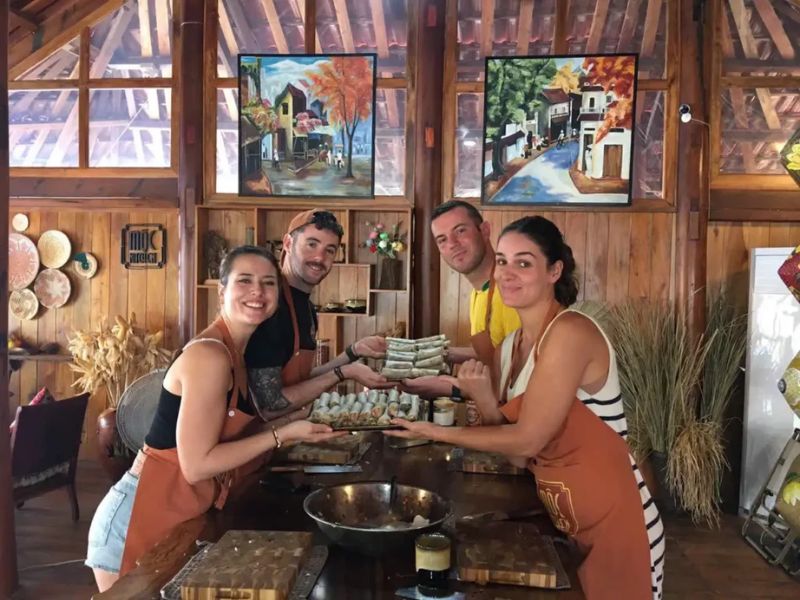 Fresh ingredients being gathered since some Phu Quoc cooking class programs include a visit to local farms within easy reach of Corona Casino Phu Quoc