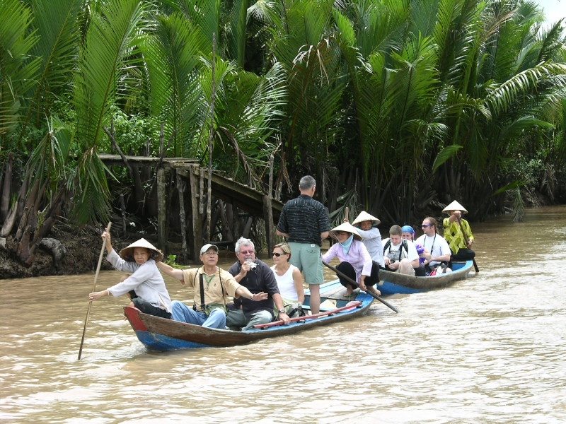 International travelers travel through the Mekong Delta before boarding a speedboat from Rach Gia for a stay at the world-class Corona Casino Phu Quoc