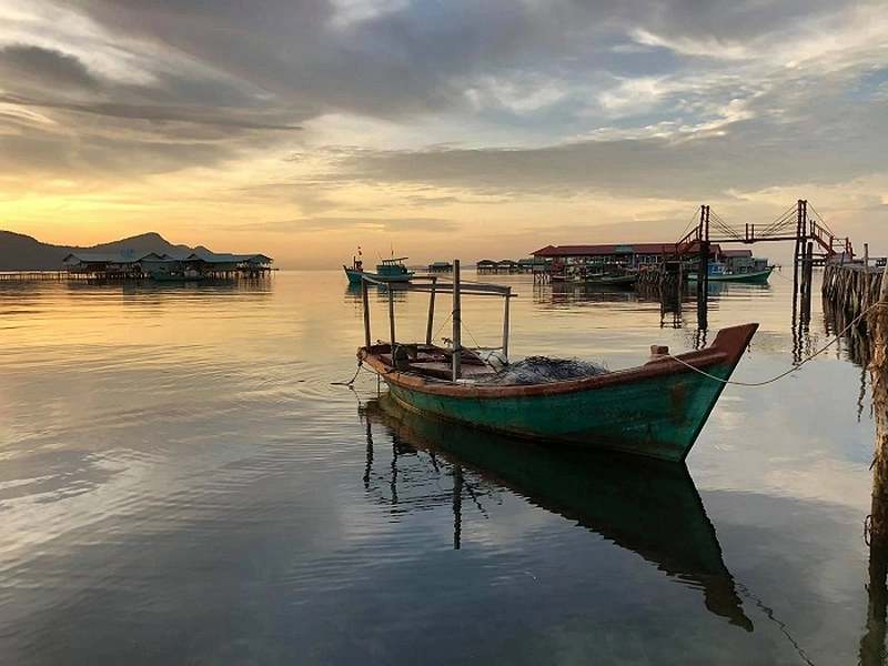 A traditional fishing boat anchored in a fishing village in Phu Quoc near Corona Resort & Casino Phu Quoc