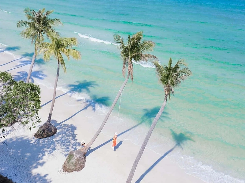 Scenic beach swing on a white sand tropical shore in Phu Quoc - Corona Resort & Casino Phu Quoc