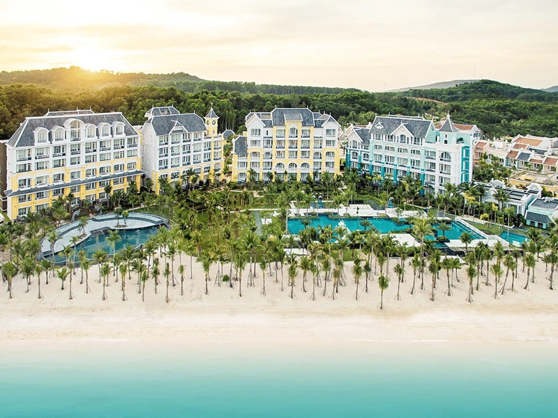 JW Marriott Phu Quoc Emerald Bay villa exterior with private pool and Bill Bensley academic architecture, located in the south while Corona Resort & Casino Phu Quoc is in the north