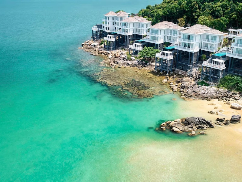 Premier Village Phu Quoc infinity pool villa on private hillside with southern coastline sunset view, easily accessible from Corona Resort & Casino Phu Quoc
